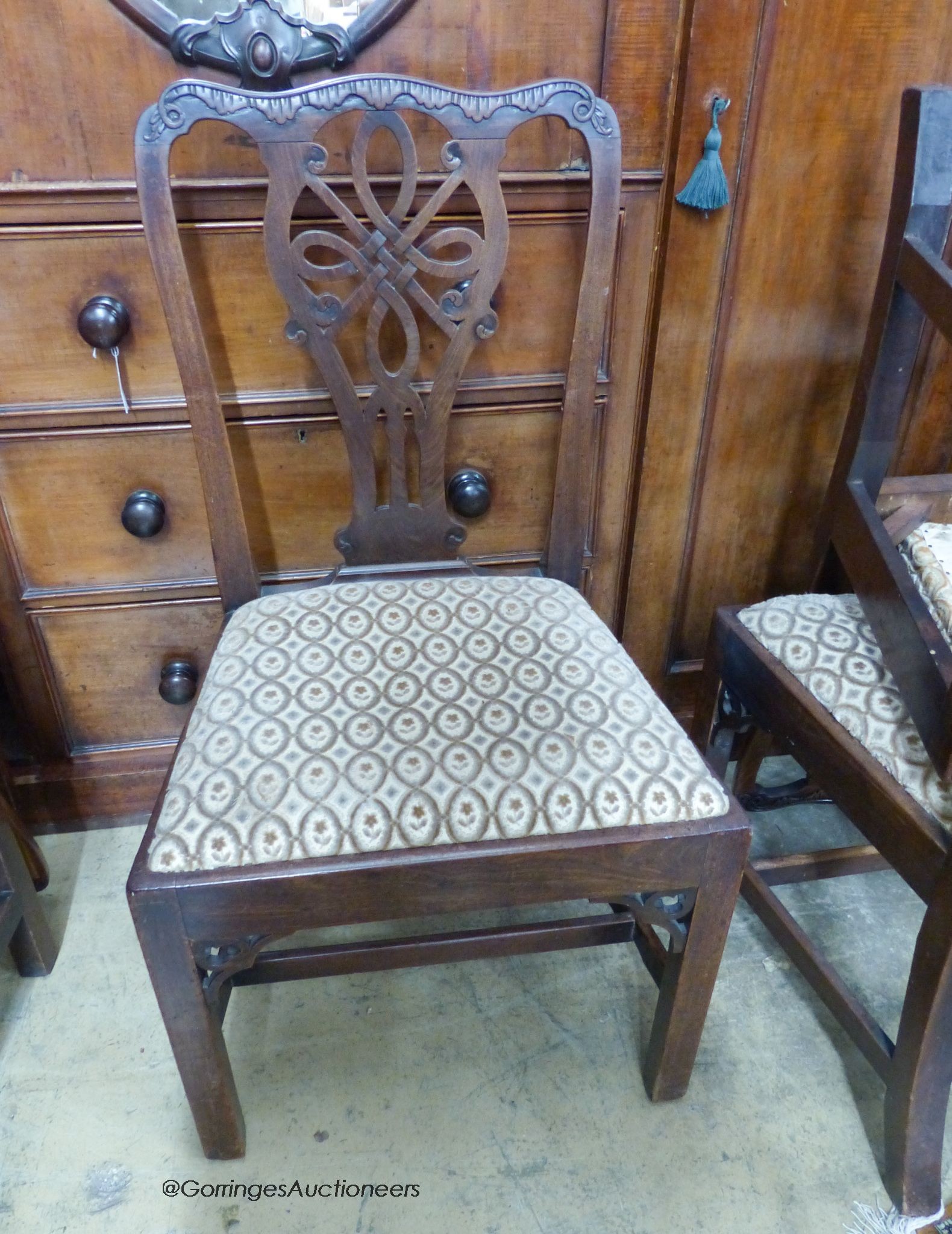 A part set of five George III mahogany dining chairs with vase splats